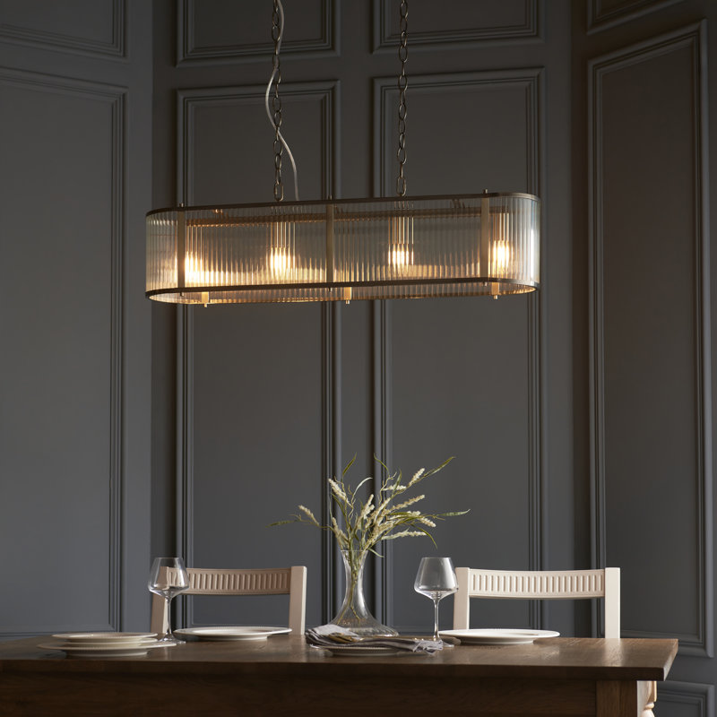 Anesty 4lt Linear Pendant light finished in Ant. Brass