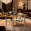 Table basse moderne ovale avec plateau en verre trempé, tablettes de rangement et structure en métal-1517398934-1515439435