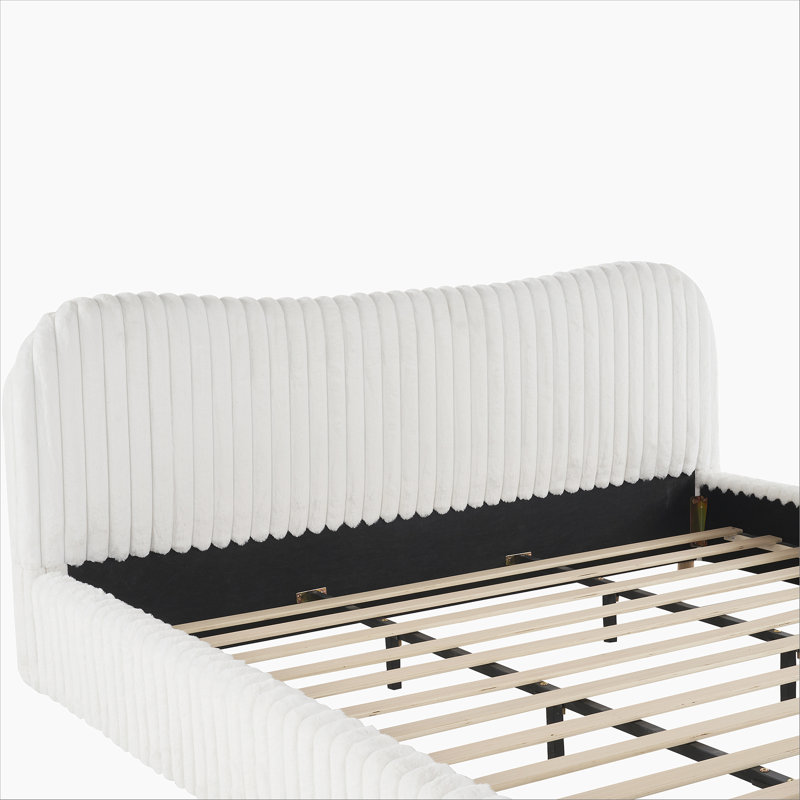 Lit tapissier élégant avec tête ondulée et coutures verticales