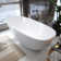 66.9'' x 29.5'' Freestanding Soaking Solid Surface Bathtub