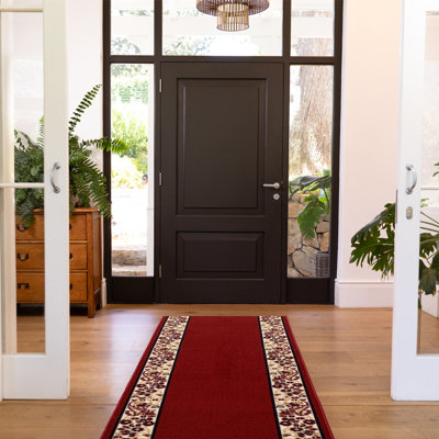 Tapis rouge à motif floral Bristal