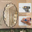 Miroir mural élégant et ovale ondulé-107728797-107728817