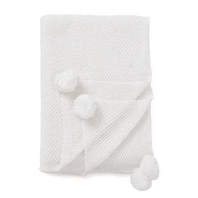Jeté à pompons