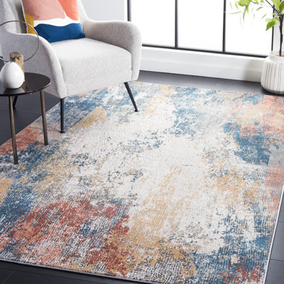 Tapis Kulig en ivoire / bleu rouille