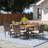Anivea 6 - Person Acacia Wicker Patio Dining Set with Rectangular Table , Cushions Included