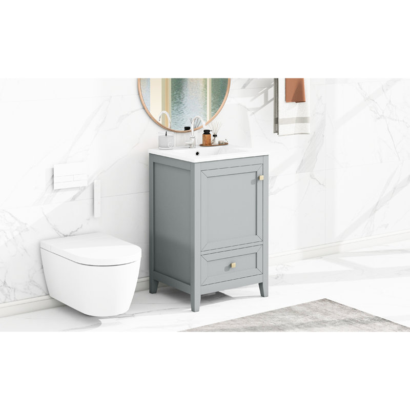 Meuble-lavabo de 20 po avec lavabo, gris. Porte d'armoire et rangement tendance. Panneau et céramique. Finition à l'eau. Assemblage requis 20 po, options de rangement robustes. Imperméable.