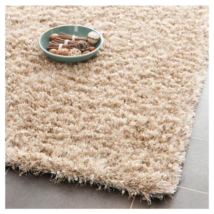 Delane Handmade Tufted Brown Area Rug