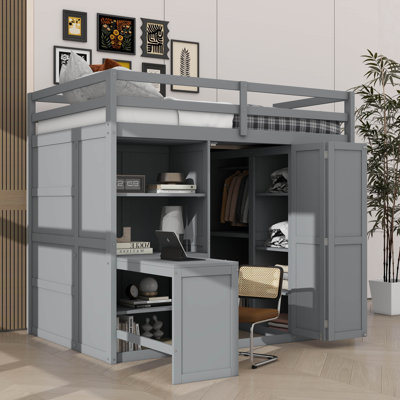 Lit mezzanine double équipé d'une armoire, d'un bureau et de tablettes