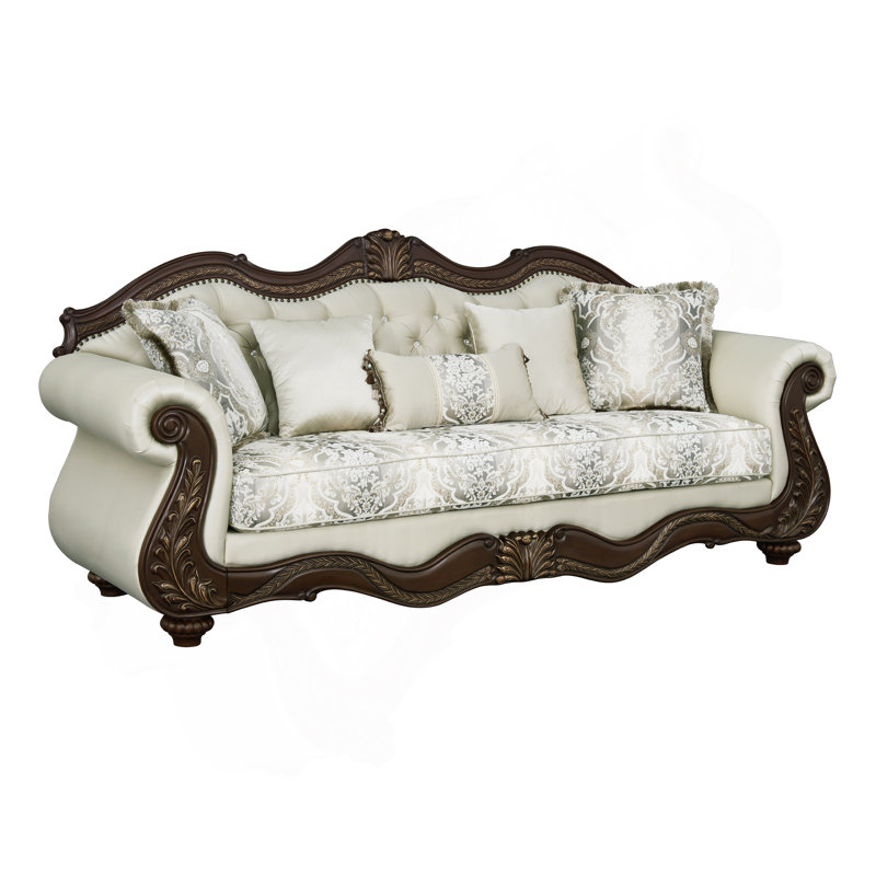 Canapé Pierce en tissu beige et finition cerise avec 5 coussins