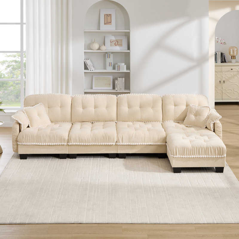 Canapé en forme de L de 131 po avec repose-pieds mobile et 4 coussins décoratifs en tissu de chenille orange matelassé