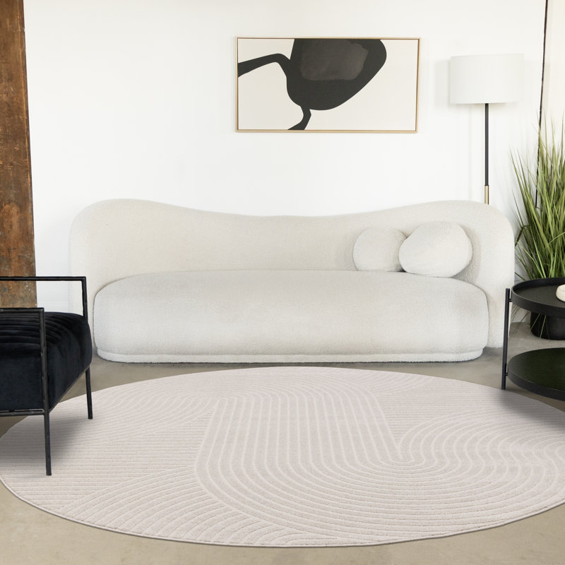 Tapis rond blanc à motif géométrique 6 pi 7 po x 6 pi 7 po