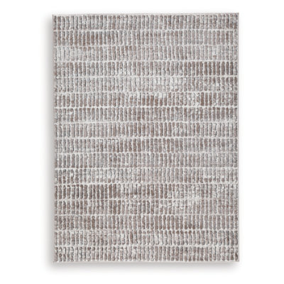 Fuadwick 5'3" X 7' Area Rug