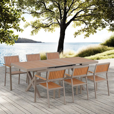 Freedom Outdoor Dining Table Set Including Six Chairs And A Extendable Table