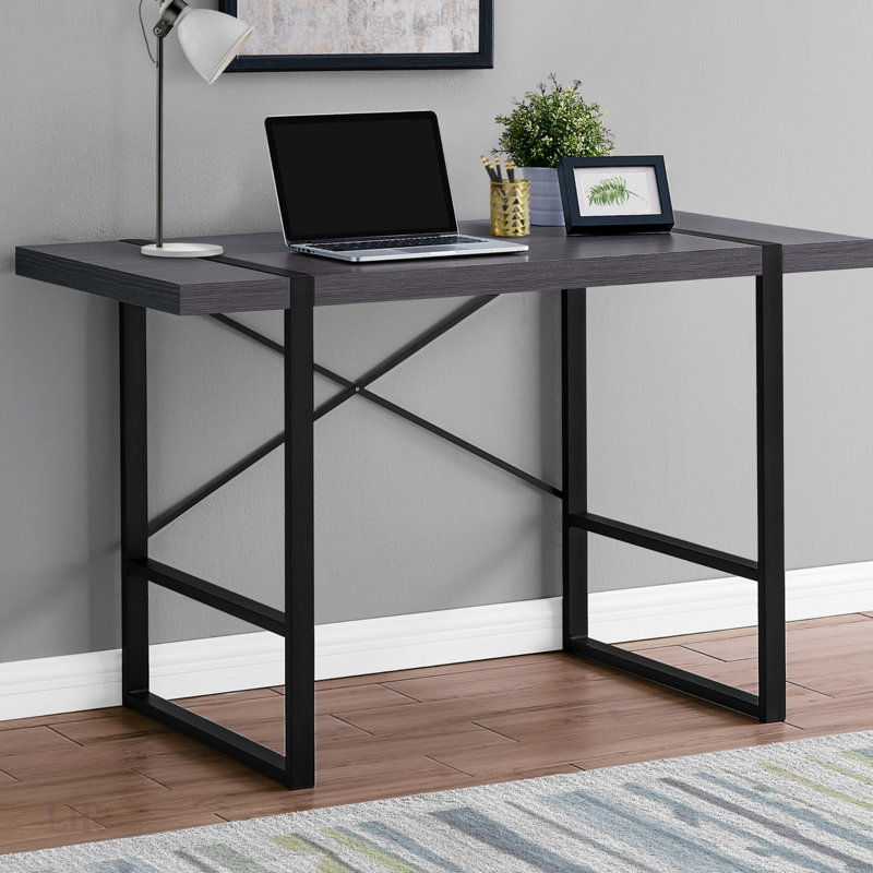 Bureau d'ordinateur moderne avec plateau en stratifié gris et structure en métal noir, parfait pour le bureau à domicile et l'ordinateur portable.