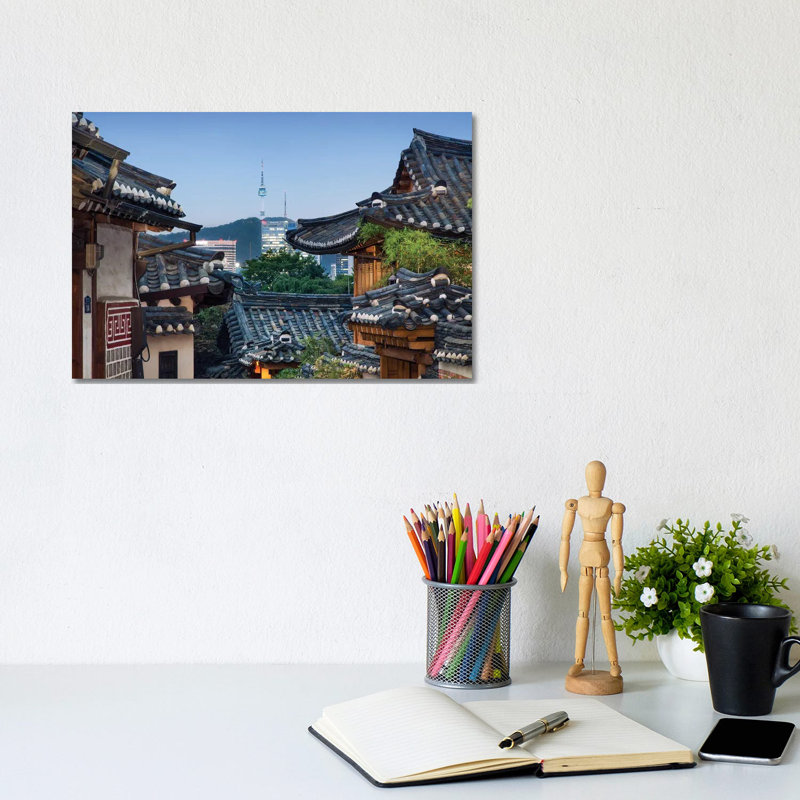 Historic Bukchon Hanok Village In Seoul With View Of The N Seoul Tower And Namsan Mountain At Night by Jan Becke - Wrapped Canvas Print