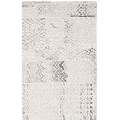 Tajolosa Hand Tufted Viscose/Wool Southwestern Rug in Natural/Ivory