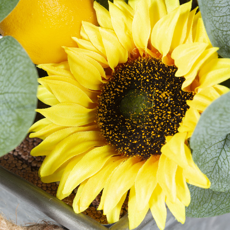 Arrangement floral en tournesol, citron et eucalyptus