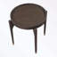 Table de bout ronde avec quatre pieds robustes