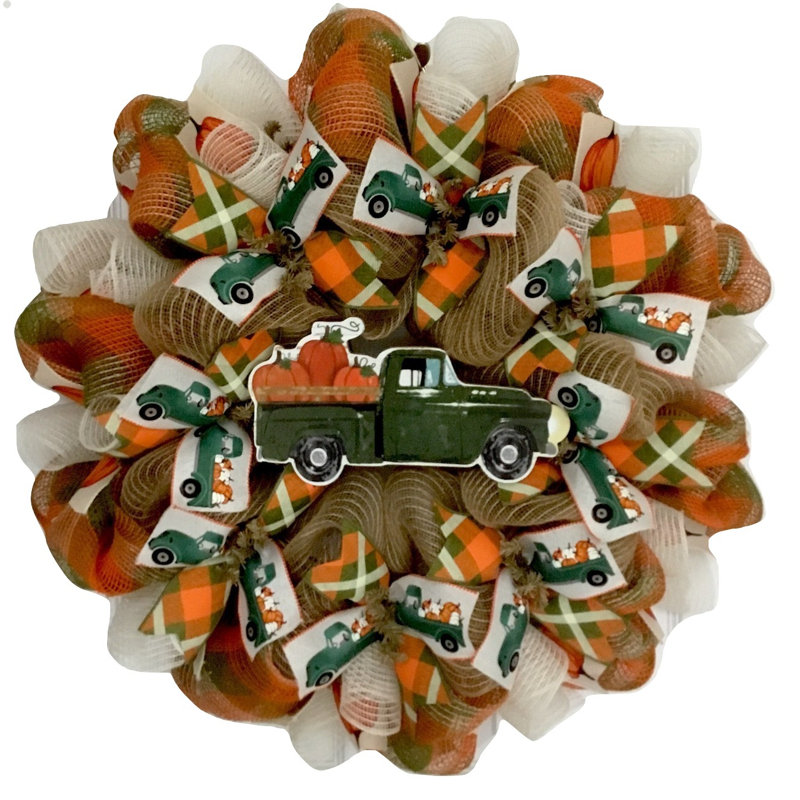 Camion à couronne de récolte avec citrouilles