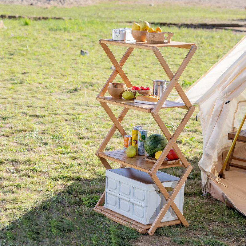 La table pliante à 4 niveaux avec plateau de rangement multifonctionnel se transforme en un support de rangement portatif en bois de hêtre pour une utilisation intérieure, extérieure, camping et polyvalente