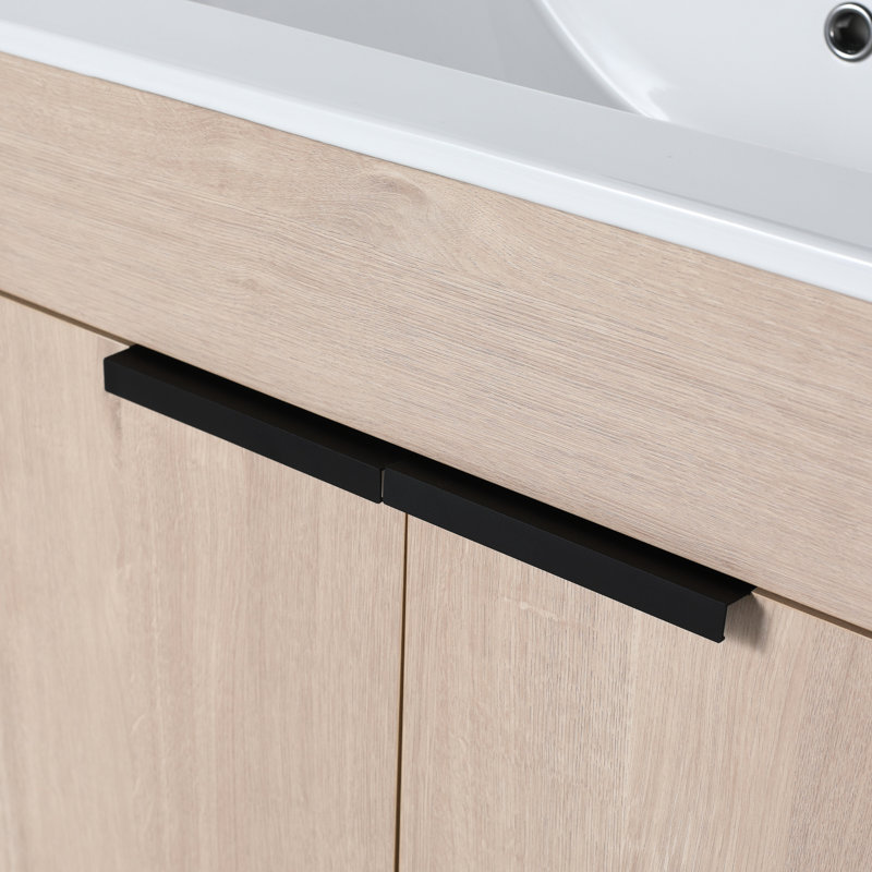 Meuble-lavabo autoportant de 30 po avec lavabo en céramique blanche. 2 portes d'armoire à fermeture en douceur. Design moderne. Chêne uni. Contreplaqué. Tablette réglable. Poignées en métal pour un style élégant. Moderne. Charmant