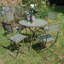 Hulste 4 - Person Patio Dining Set with Round Table , Cushions Included