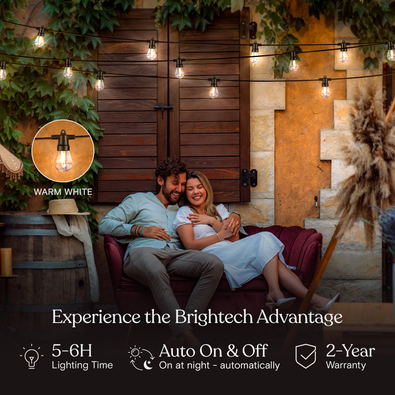 Ambience Pro 27 ft. Solar Outdoor Patio LED String Lights with 12 Warm White S14 Bulbs, 15 Hanging Hooks Included, Weatherproof