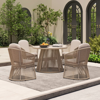 Outdoor Round 4 - Person 43.3" Long Dining Set With Cushions