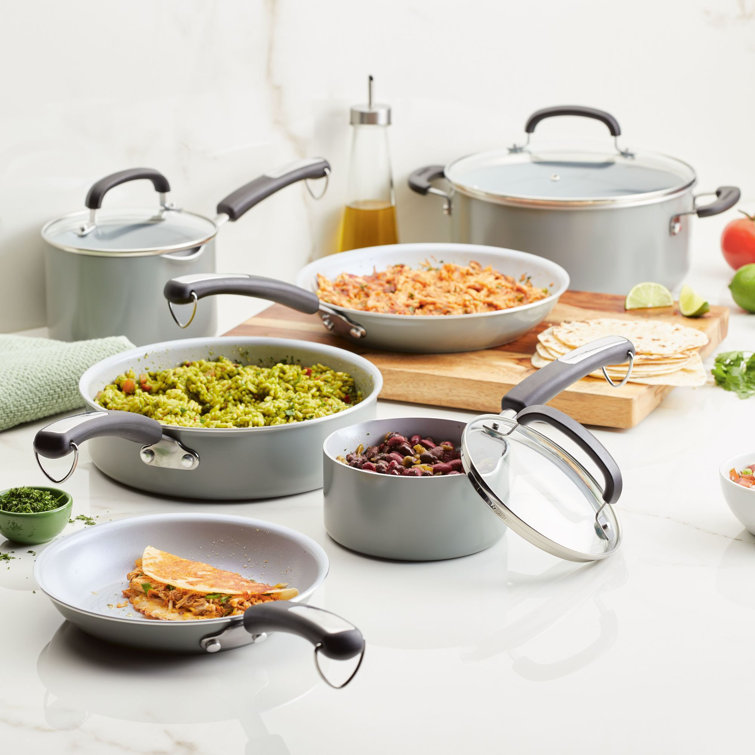 https://assets.wfcdn.com/im/52221702/resize-h755-w755%5Ecompr-r85/2171/217146617/Farberware+Eco+Advantage+Ceramic+Nonstick+Cookware+Pots+and+Pans+Set+with+Cooking+Tools%2C+13+Piece.jpg