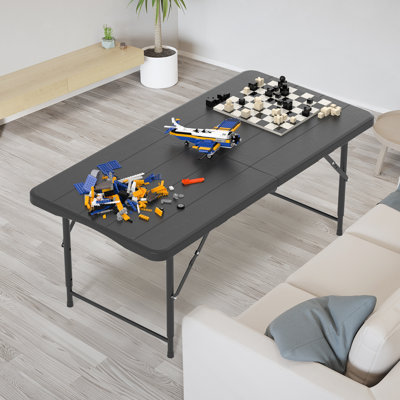 4 Ft Black Plastic Rectangular Folding Table