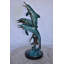 Statue de trois dauphins sautant sur l'océan en bronze 12 po x 12 po x H 25 po.