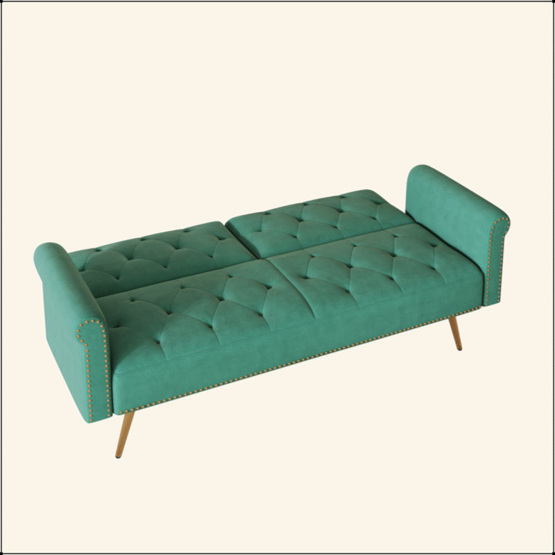 Un canapé-lit de 69,7 pouces de long recouvert de tissu de velours, avec une garniture cloutée et un coussin décoratif assorti