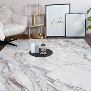 Abstract Machine Woven Beige Area Rug