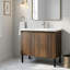 Meuble-lavabo autoportant avec lavabo en céramique, portes à fermeture en douceur et tablettes intégrées-128923438-128923442