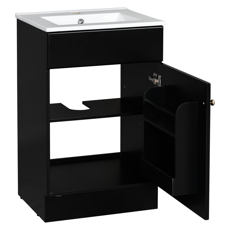 Meuble-lavabo noir de 50 cm avec vasque. Armoire à panneaux, tablette de porte et tablette intérieure réglable. Vasque en céramique lisse et imperméable. Vasque à charnières, noire. Armoire à utiliser. Revêtement teinté pour la vasque.