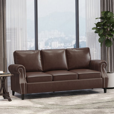 Charming Faux Leather Three - Seater Sofa With Rolled Armrests, Studded Trim And Birch Legs For A Contemporary Living Space