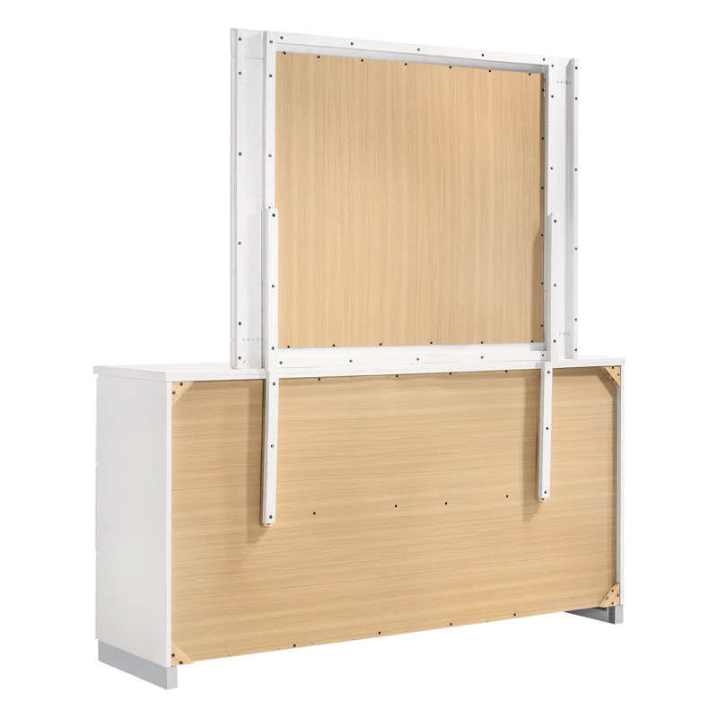 Ensemble de chambre à coucher Genevieve White pour lit simple, comprenant un lit rembourré, une commode et un miroir.