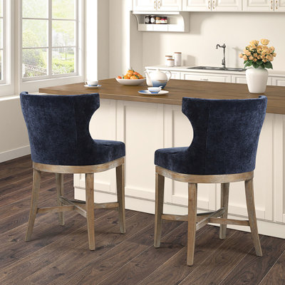 Tabouret de bar pivotant - Revêtement bleu marine, pieds en bois massif, capacité de 136 kg, un charme intemporel et élégant.