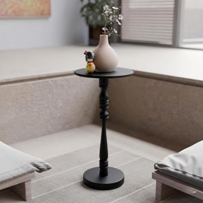 Table d'appoint ronde Stambha en bois massif de manguier, finition noire artisanale, idéale pour le salon, la chambre ou comme support pour plantes d'intérieur, plateau compact de 30 cm.