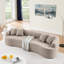 Canapé modulaire courbé en laine d'agneau brun, conception moderne, comprimé, sans assemblage, mousse haute densité pour le confort du salon modulaire, ambiance-67033455