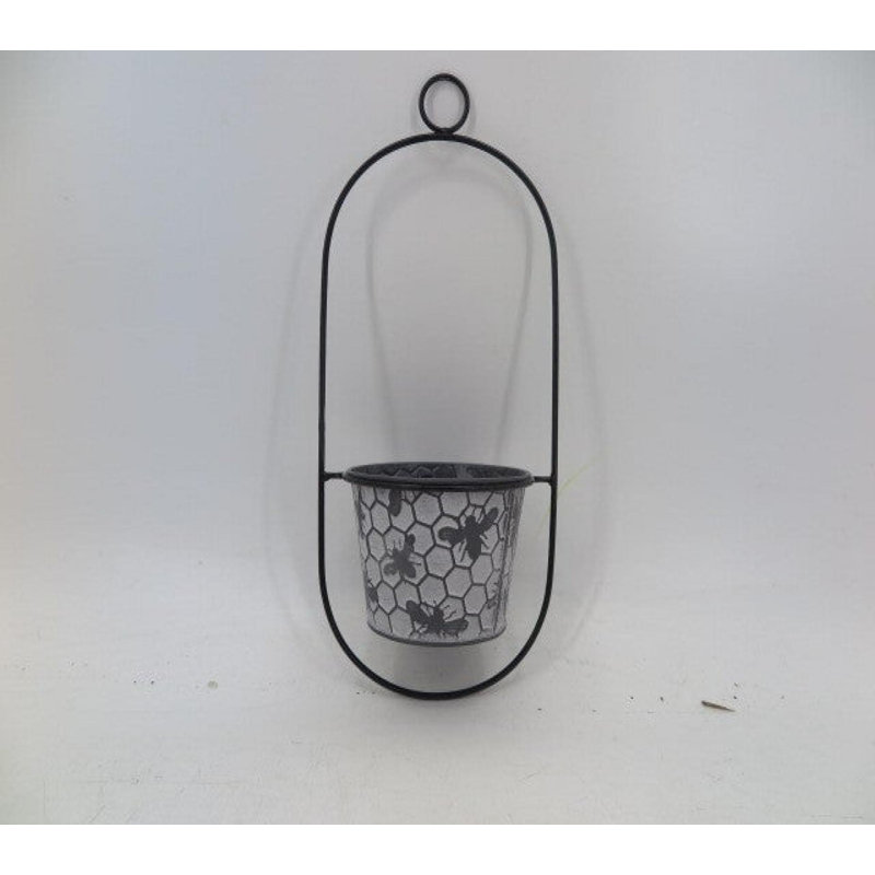 Pot à fleurs suspendu en forme de peigne et abeilles blanches