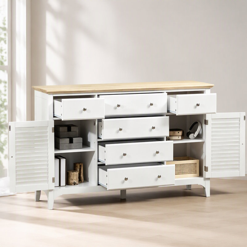 Élégante armoire de rangement avec tiroirs spacieux et design à persiennes, idéale pour les intérieurs modernes et les espaces organisés.