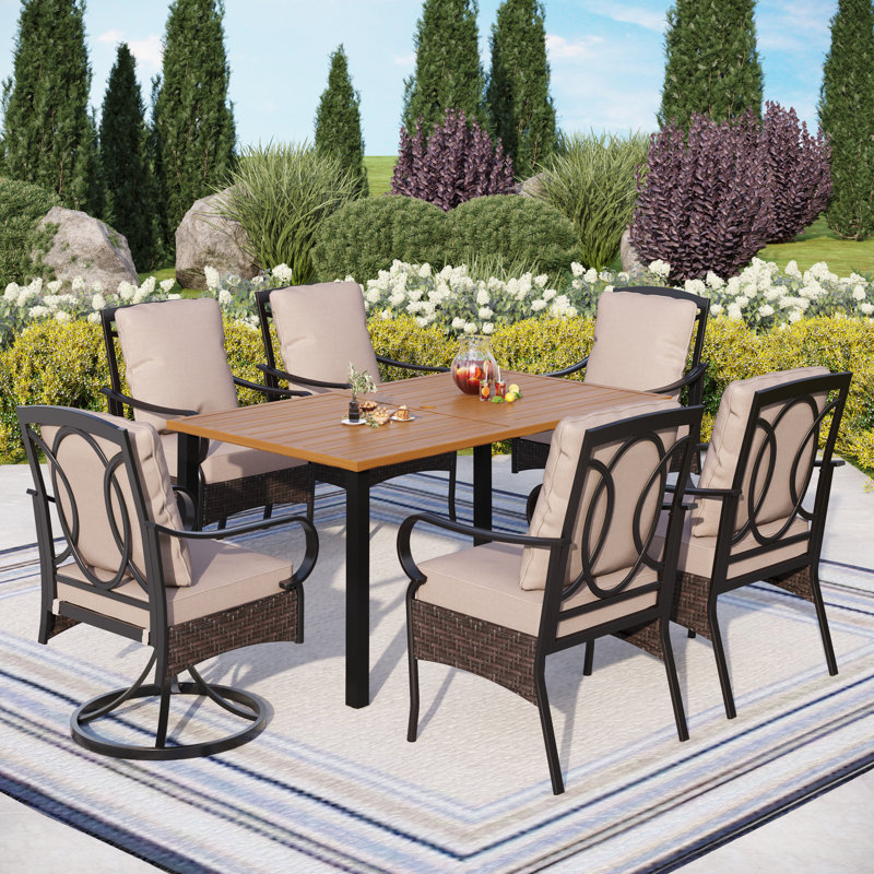 Sutiya 6 - Person Steel Patio Dining Set Umbrella Hole Included Rectangular Table with Cushions Included
