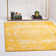 Tapis jaune tissé à la reine Reine