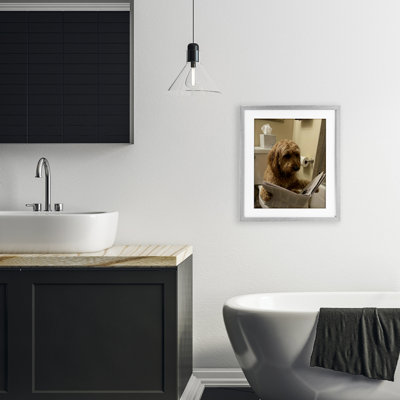Dog & Paper on Toilet Framed Print Under Glass, design by Abigail Walker