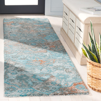 Tapis floral en polyester touffeté à la main Fredel - bleu / brun