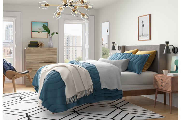 Mid-century modern bed with wood and gray upholstery