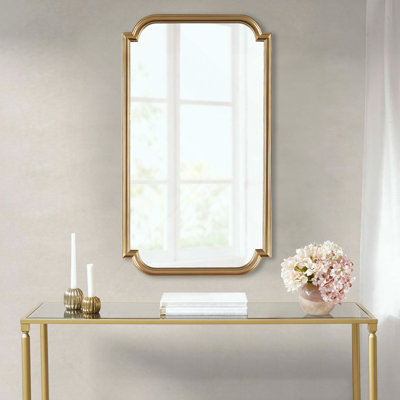 Miroir mural doré
