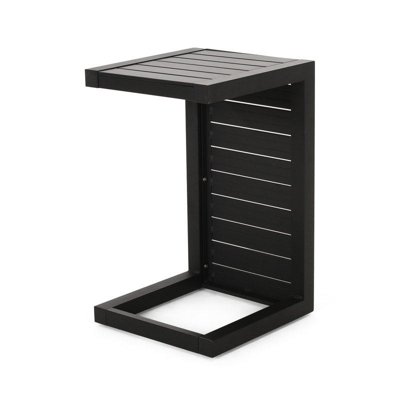 Table d'appoint d'extérieur avec surface moderne noir mat, texture