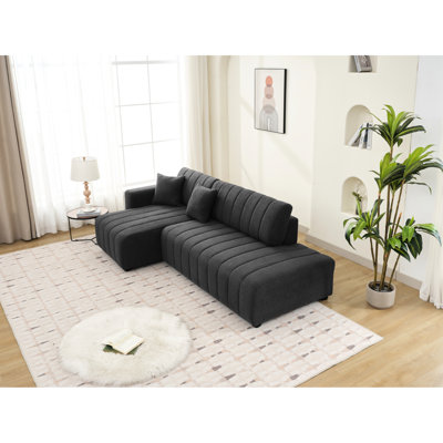 Coin en forme de L à 3 sièges avec esthétique scandinave, revêtement en laine gris foncé, rembourrage en mousse, modulaire et réversible, lignes épurées, palette neutre, style dossier, sièges, laine, rembourrage, couleurs,